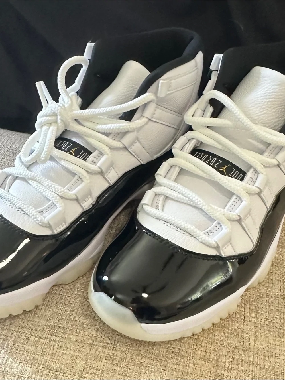 Air Jordan’s 11 Never Been Worn Black and White High-Top Athletic Sneakers